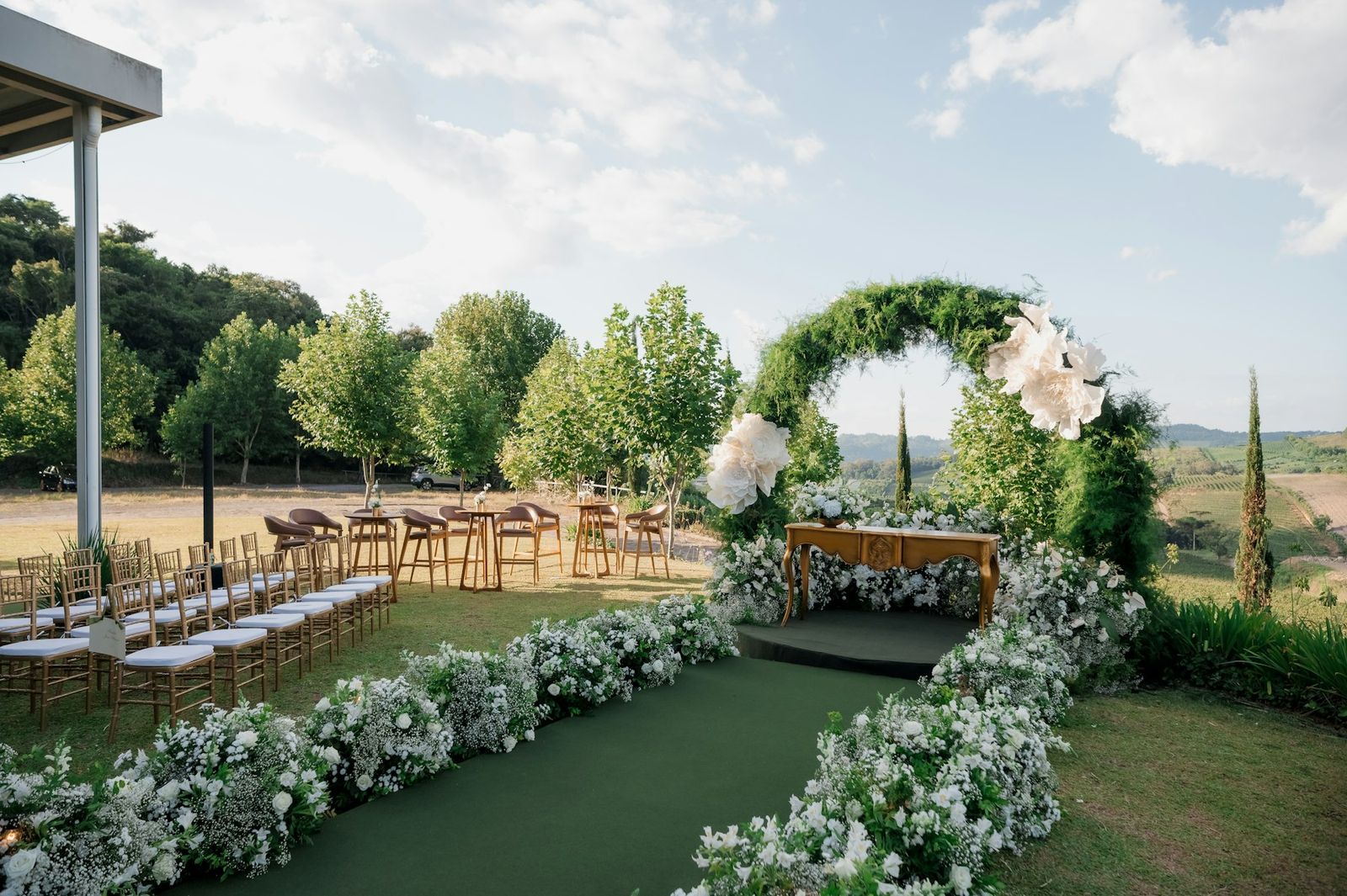Floral ceremony arch on the lawn